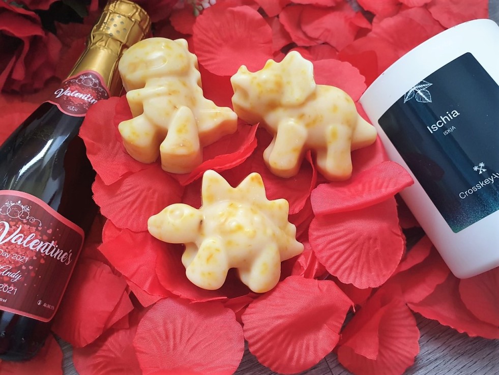 Valentine's Day Gift ideas showing champers bootle, dino soaps and candle